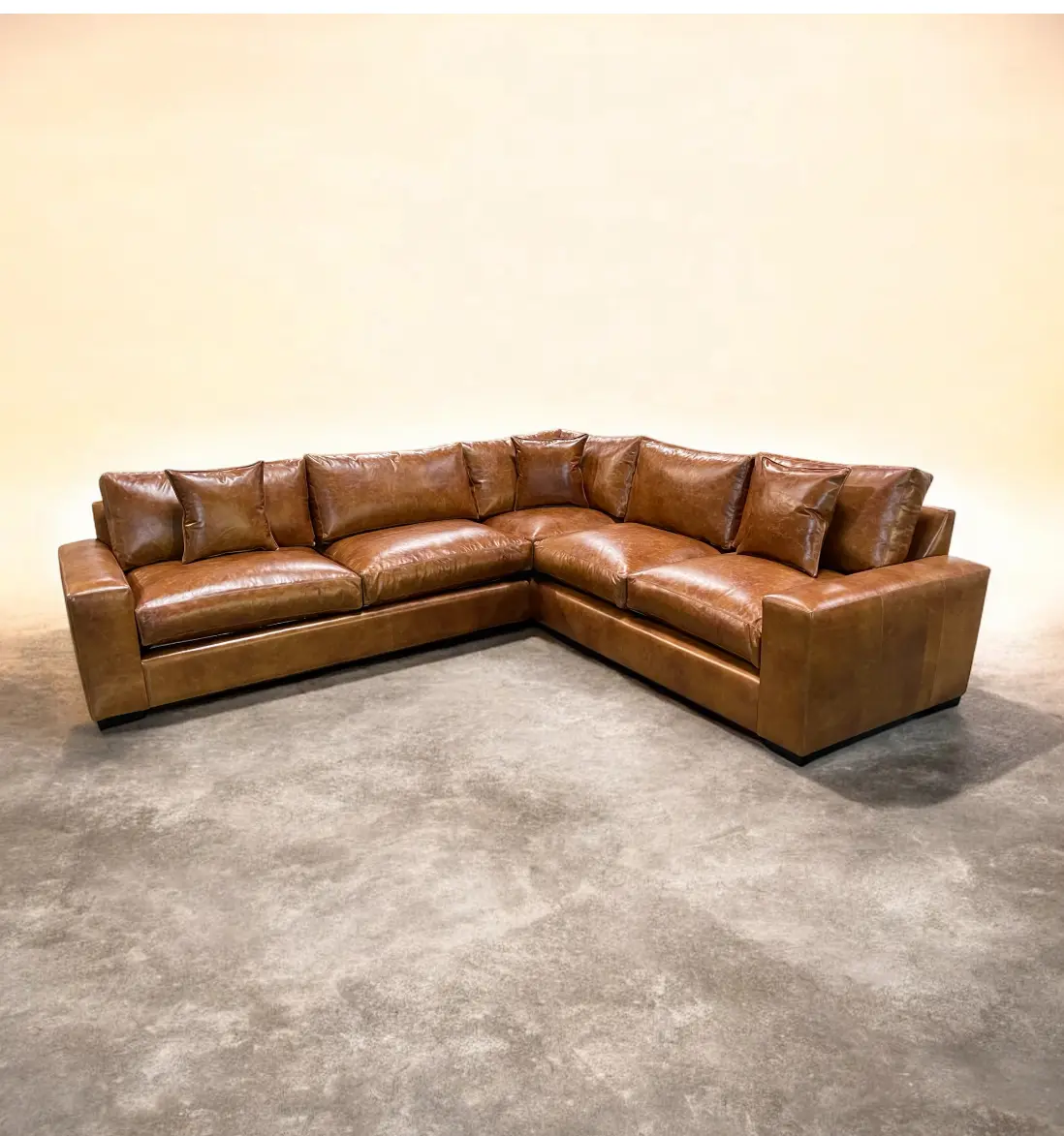 Brown leather L-shaped sectional sofa