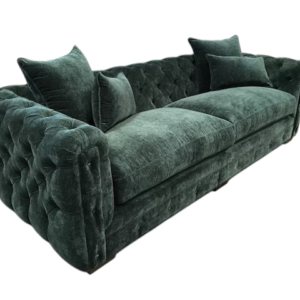 Emerald velvet tufted sofa with pillows