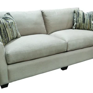 Beige upholstered sofa with patterned throw pillows