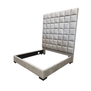 Gray upholstered platform bed with tall tufted headboard