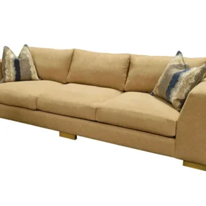 Beige modern three-seat sofa with decorative pillows