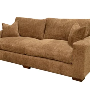 Brown upholstered three-seat sofa with pillows